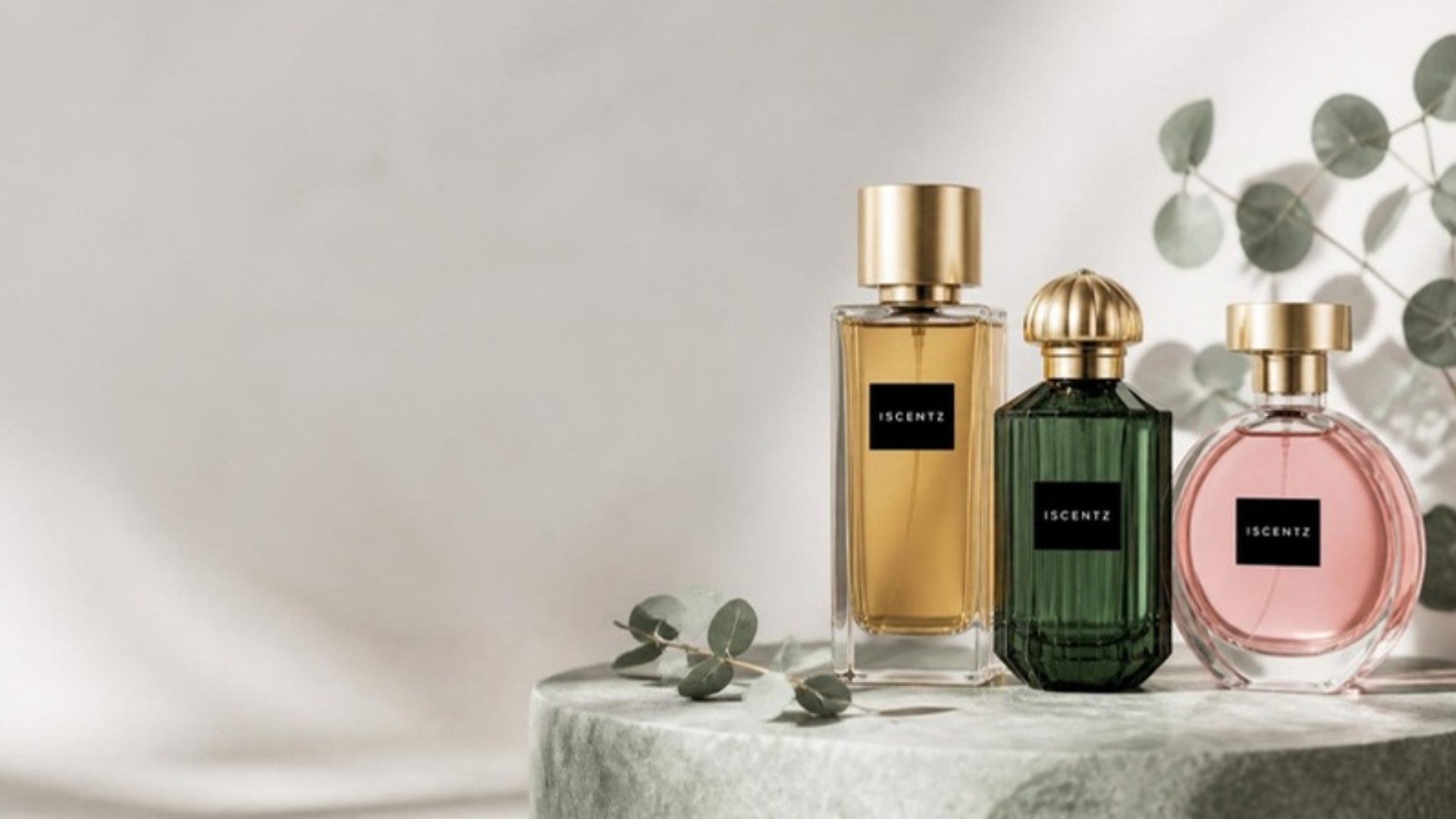 Iscentz signature perfumes on a stone plinth